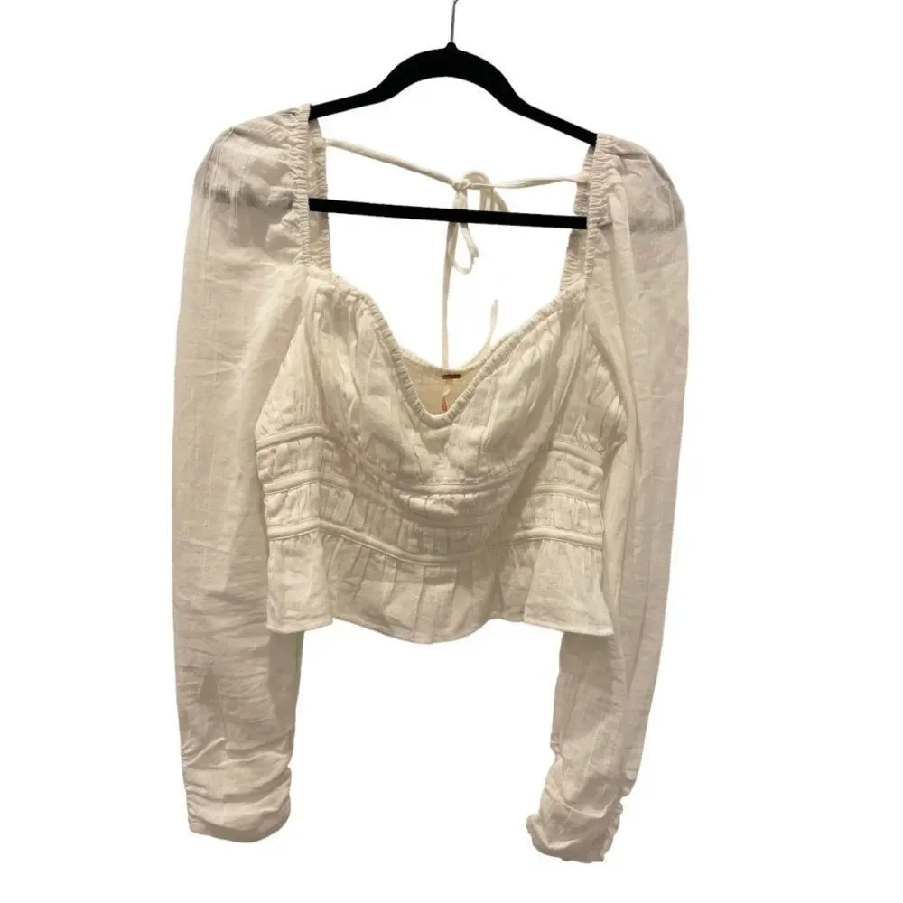 Free People Chloe puff sleeve blouse in white.Size M